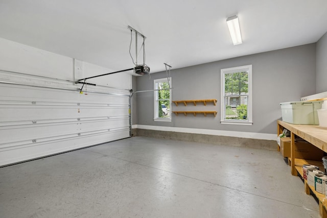 923 Hornsby Dr, Franklin, TN 37064 - garage featuring a garage door opener and baseboards