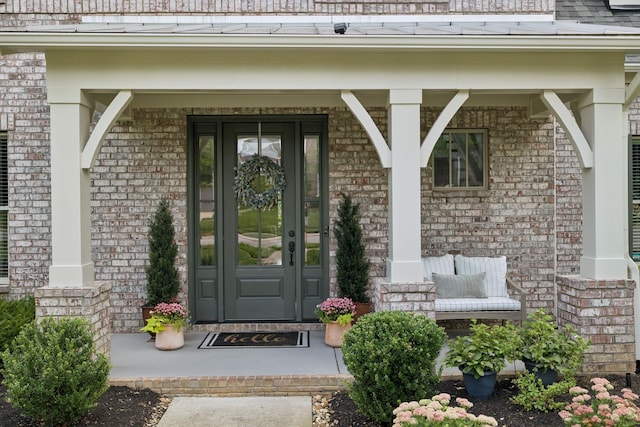 923 Hornsby Dr, Franklin, TN 37064 - view of exterior entry with covered porch and brick siding