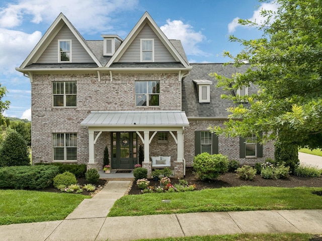 923 Hornsby Dr, Franklin, TN 37064 - view of front of property featuring brick siding, a porch, a front lawn, and roof with shingles