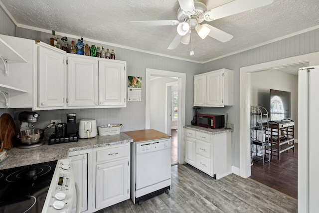 410 England St E, Cowan, TN 37318 - kitchen with white dishwasher, crown molding, wood finished floors, open shelves, and light countertops