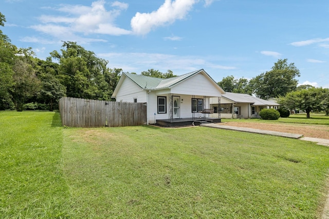 410 England St E, Cowan, TN 37318 - view of front of house featuring a metal roof and covered porch