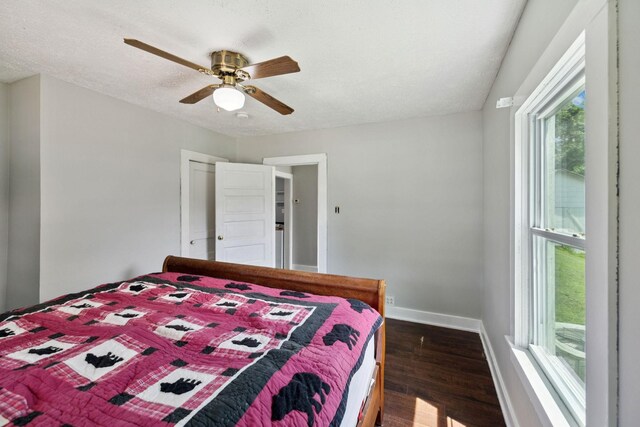 410 England St E, Cowan, TN 37318 - bedroom featuring dark wood finished floors, ceiling fan, and a textured ceiling