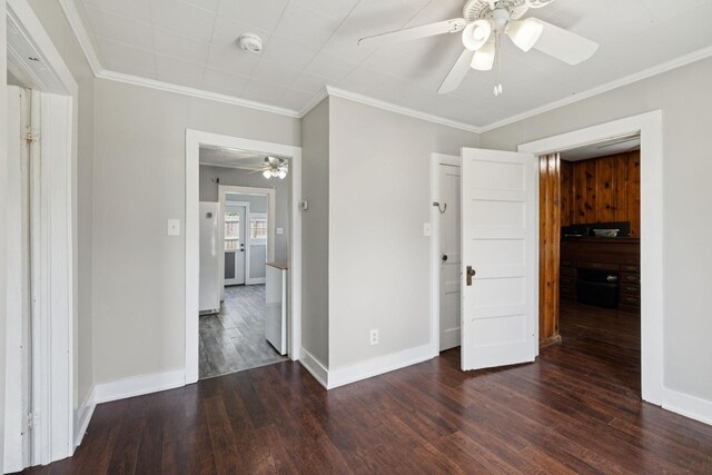 410 England St E, Cowan, TN 37318 - unfurnished bedroom with dark wood-type flooring, crown molding, and ceiling fan