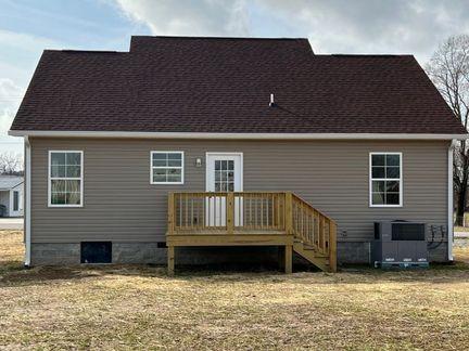 484 Meadowbrook Dr, Mcminnville, TN 37110 - rear view of house with a wooden deck, a lawn, and crawl space