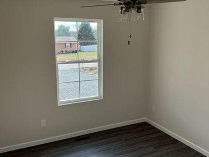 484 Meadowbrook Dr, Mcminnville, TN 37110 - unfurnished dining area with a ceiling fan and dark wood finished floors