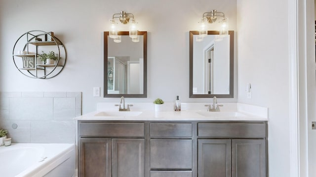 1197 Ewing Way, Clarksville, TN 37043 - bathroom featuring double vanity and a bath