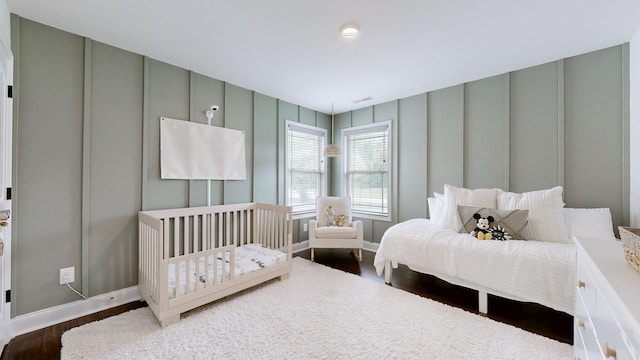 1197 Ewing Way, Clarksville, TN 37043 - bedroom with a decorative wall and wood finished floors