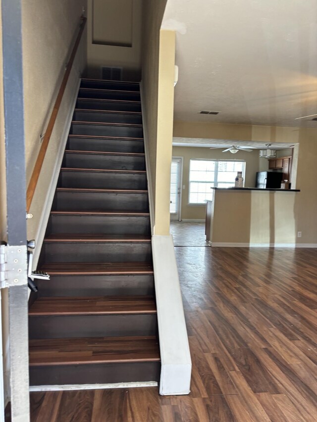 1023 Sitting Bull Xing, Murfreesboro, TN 37128 - stairway with ceiling fan and wood finished floors