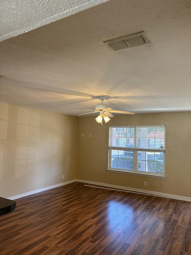 1023 Sitting Bull Xing, Murfreesboro, TN 37128 - unfurnished room featuring dark wood-type flooring, a textured ceiling, and a ceiling fan