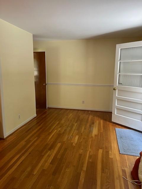 4805 Bowfield Dr, Antioch, TN 37013 - spare room featuring wood finished floors and built in features