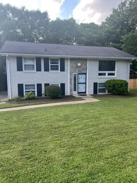4805 Bowfield Dr, Antioch, TN 37013 - bi-level home featuring a front lawn and brick siding