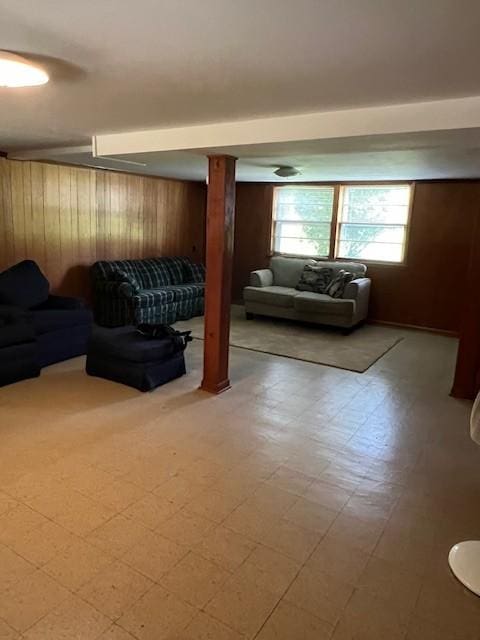 4805 Bowfield Dr, Antioch, TN 37013 - living area featuring tile patterned floors and wood walls