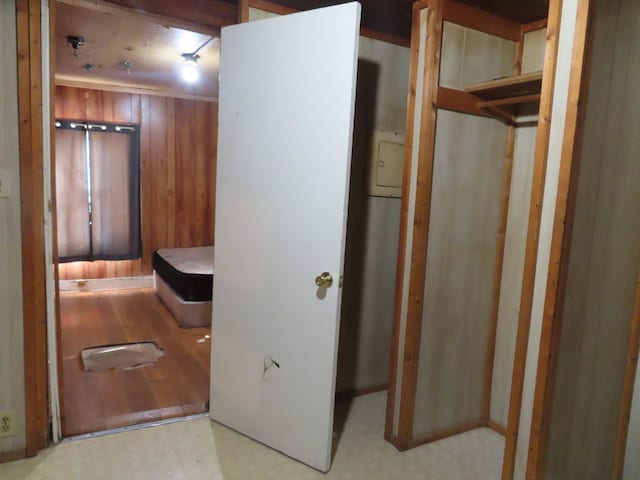 910 17th Ave E, Springfield, TN 37172 - bathroom featuring tile patterned floors and wooden walls