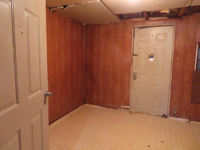 910 17th Ave E, Springfield, TN 37172 - spare room featuring wooden walls and tile patterned floors