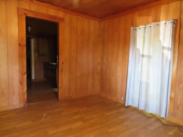 910 17th Ave E, Springfield, TN 37172 - empty room with wood walls, wood finished floors, and wood ceiling