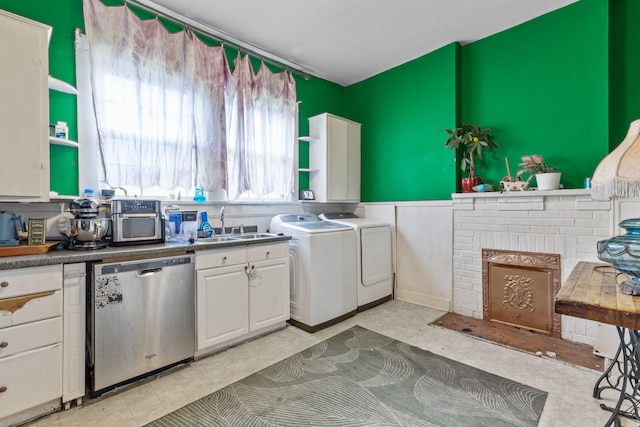 104 3rd Ave, Columbia, TN 38401 - kitchen featuring dishwasher, washing machine and dryer, open shelves, white cabinetry, and wainscoting