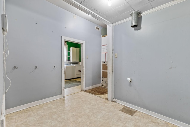 104 3rd Ave, Columbia, TN 38401 - spare room with independent washer and dryer and tile patterned floors