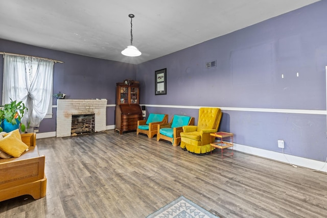 104 3rd Ave, Columbia, TN 38401 - living area featuring wood finished floors and a fireplace