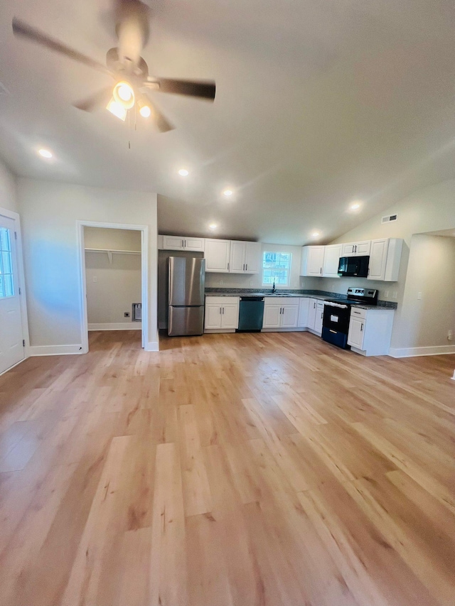 11120 Central Pike, Mount Juliet, TN 37122 - kitchen featuring freestanding refrigerator, black microwave, range with electric cooktop, dark countertops, and dishwashing machine