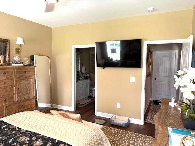 967 Horse Mountain Rd Unit 1E, Shelbyville, TN 37160 - bedroom featuring wood finished floors and connected bathroom