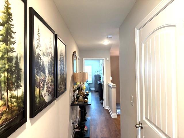 967 Horse Mountain Rd Unit 1E, Shelbyville, TN 37160 - hallway featuring wood finished floors and baseboards
