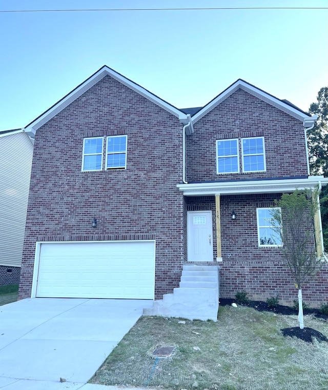 4737 Long Br, Antioch, TN 37013 - view of front facade with brick siding, a garage, driveway, and entry steps