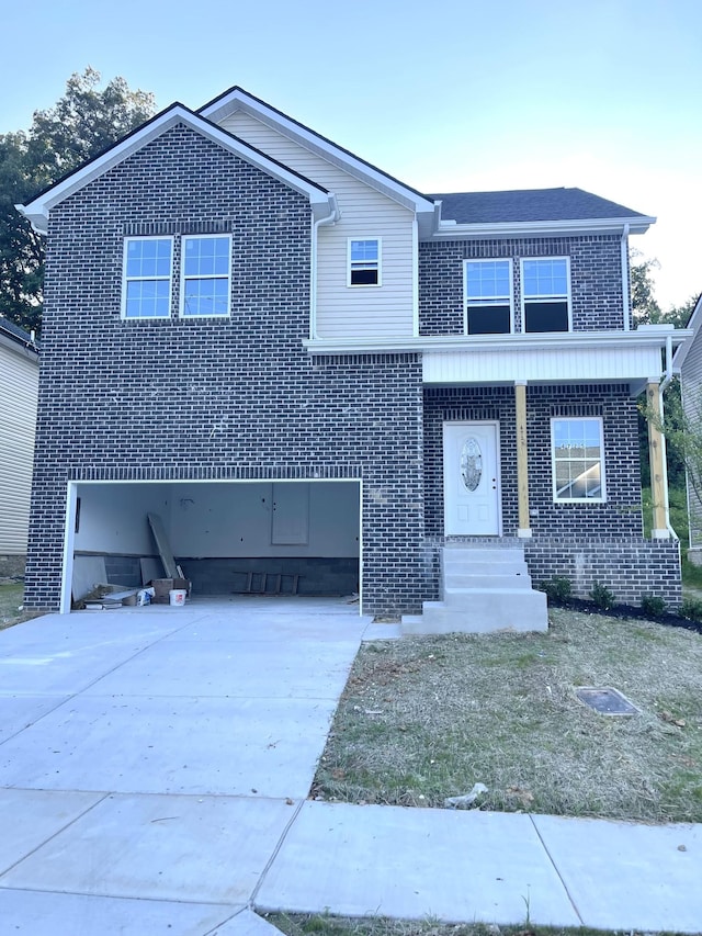 4725 Long Br, Antioch, TN 37013 - traditional home with brick siding, driveway, and a garage