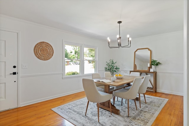 1211 Taylor Pl, Murfreesboro, TN 37129 - dining room with a chandelier, ornamental molding, and light wood finished floors