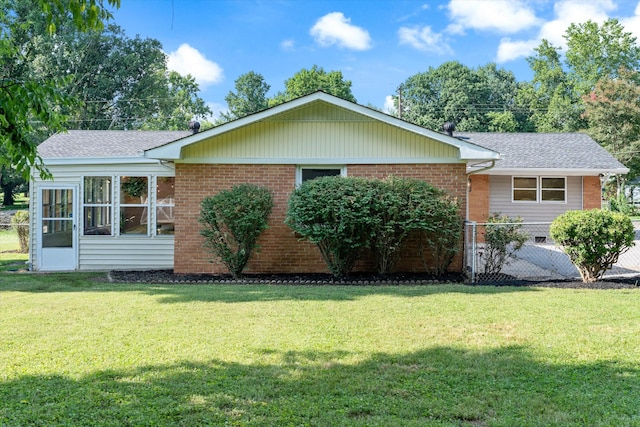 1211 Taylor Pl, Murfreesboro, TN 37129 - ranch-style home featuring brick siding, a shingled roof, and a sunroom