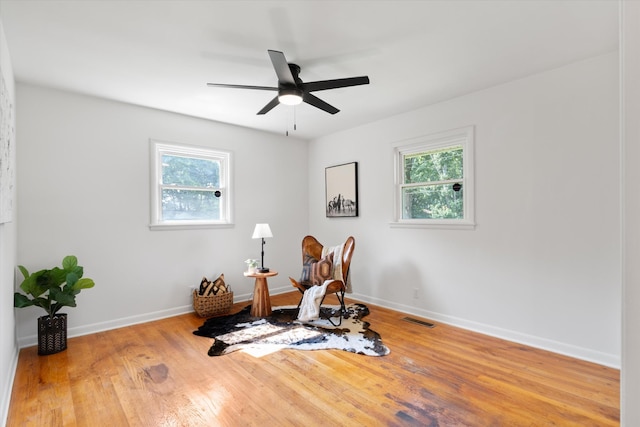 1211 Taylor Pl, Murfreesboro, TN 37129 - workout area with plenty of natural light, ceiling fan, and wood finished floors
