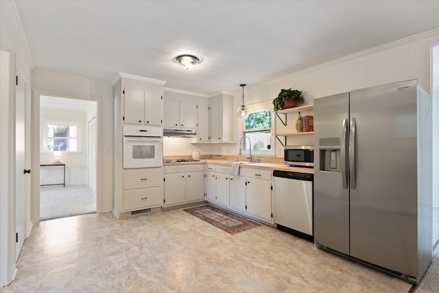 1211 Taylor Pl, Murfreesboro, TN 37129 - kitchen featuring stainless steel appliances, crown molding, light countertops, under cabinet range hood, and open shelves