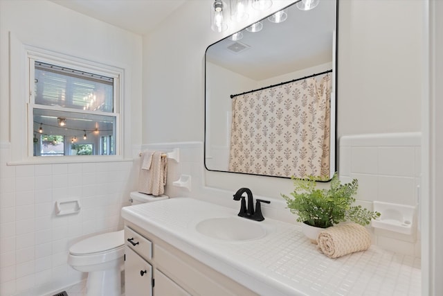 1211 Taylor Pl, Murfreesboro, TN 37129 - bathroom with tile walls, vanity, and a wainscoted wall