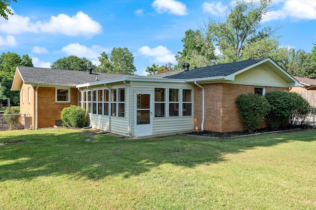 1211 Taylor Pl, Murfreesboro, TN 37129 - rear view of property with brick siding, a sunroom, and a shingled roof
