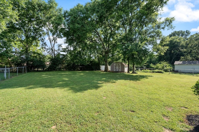 1211 Taylor Pl, Murfreesboro, TN 37129 - fenced backyard featuring a shed and view of scattered trees