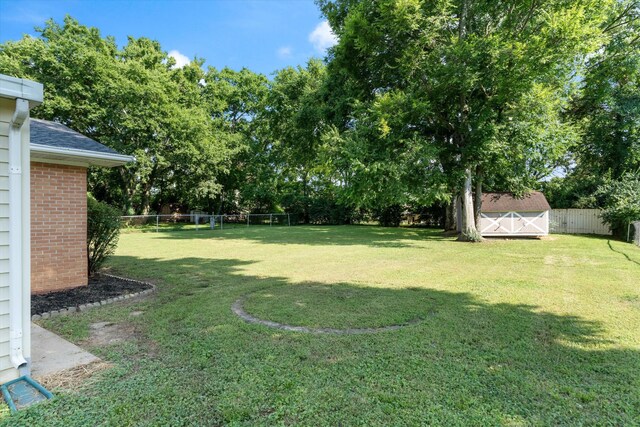 1211 Taylor Pl, Murfreesboro, TN 37129 - fenced backyard with a storage unit