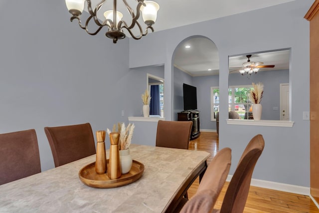 343 Belinda Pkwy, Mount Juliet, TN 37122 - dining room featuring a ceiling fan, wood finished floors, arched walkways, a chandelier, and recessed lighting