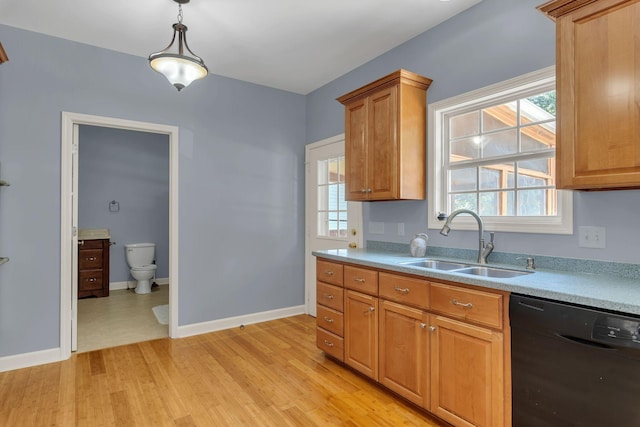 343 Belinda Pkwy, Mount Juliet, TN 37122 - kitchen featuring black dishwasher, light countertops, decorative light fixtures, light wood finished floors, and healthy amount of natural light