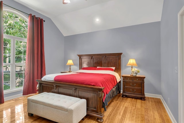 343 Belinda Pkwy, Mount Juliet, TN 37122 - bedroom featuring multiple windows, vaulted ceiling, and light wood-type flooring