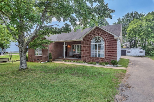 343 Belinda Pkwy, Mount Juliet, TN 37122 - view of front of property featuring covered porch, brick siding, driveway, and a front lawn