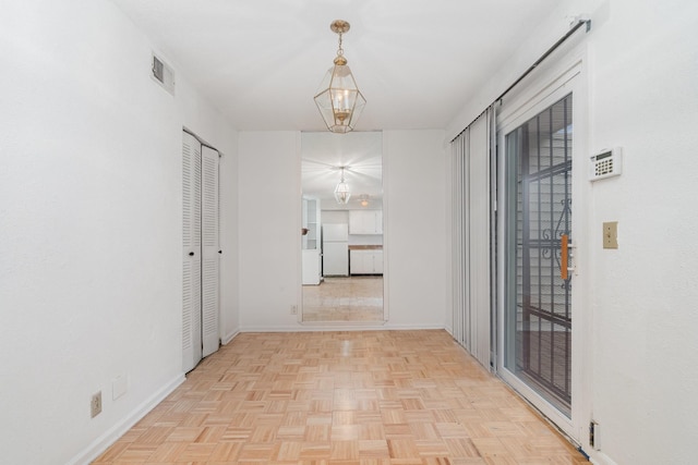 3880 Priest Lake Dr Unit 21, Nashville, TN 37217 - hallway featuring baseboards and a chandelier