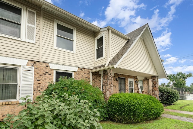 3880 Priest Lake Dr Unit 21, Nashville, TN 37217 - view of home's exterior with brick siding and a shingled roof