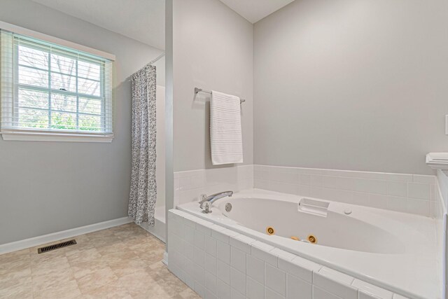2415 Franklin Ln, Murfreesboro, TN 37130 - full bathroom with a whirlpool tub and a shower with curtain