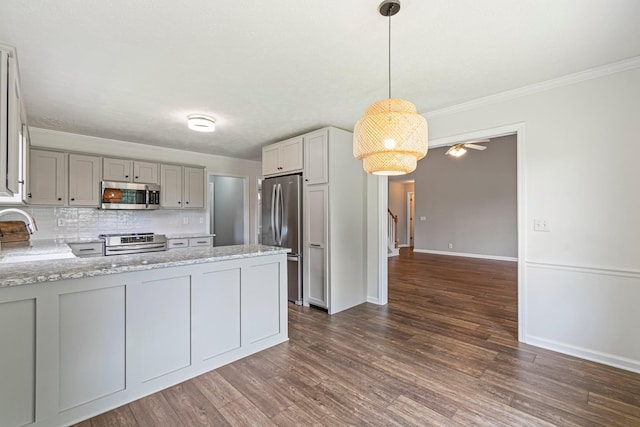 2415 Franklin Ln, Murfreesboro, TN 37130 - kitchen with stainless steel appliances, gray cabinetry, a peninsula, tasteful backsplash, and dark wood finished floors
