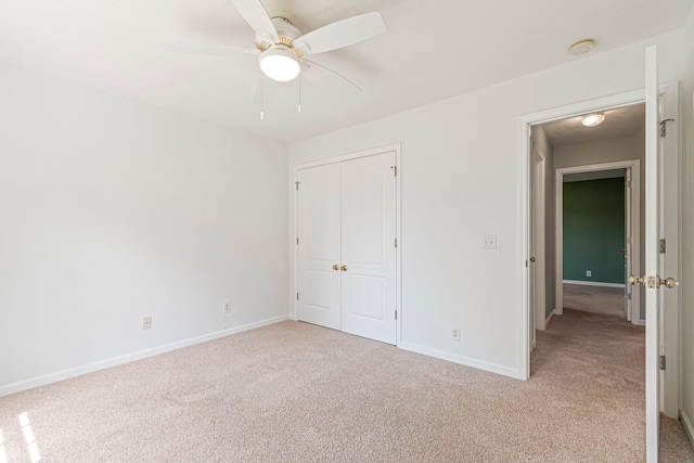 2415 Franklin Ln, Murfreesboro, TN 37130 - unfurnished bedroom featuring light carpet, a closet, and ceiling fan