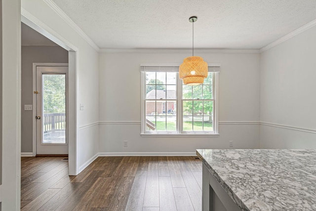 2415 Franklin Ln, Murfreesboro, TN 37130 - unfurnished dining area with dark wood finished floors, a textured ceiling, and crown molding