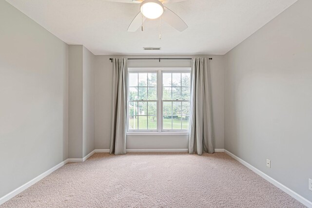 2415 Franklin Ln, Murfreesboro, TN 37130 - spare room with light colored carpet and a ceiling fan