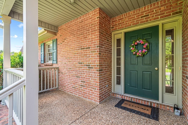 2415 Franklin Ln, Murfreesboro, TN 37130 - doorway to property featuring covered porch and brick siding