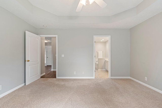 2415 Franklin Ln, Murfreesboro, TN 37130 - unfurnished bedroom featuring carpet flooring, a raised ceiling, ceiling fan, and ensuite bathroom