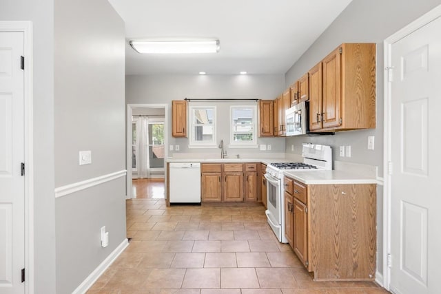 4416 Churchill Pl, Old Hickory, TN 37138 - kitchen featuring white appliances, light countertops, light tile patterned floors, and recessed lighting