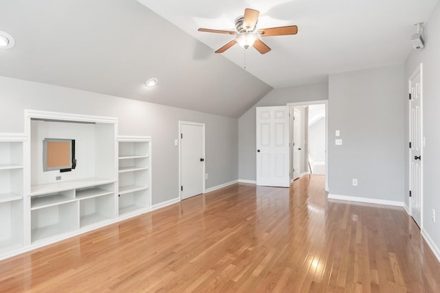 4416 Churchill Pl, Old Hickory, TN 37138 - unfurnished living room with a ceiling fan, light wood-type flooring, lofted ceiling, and built in shelves